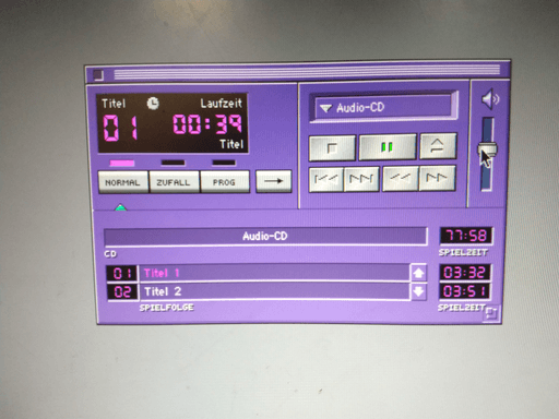 Apple music player showing playback of Track 01 at 00:39