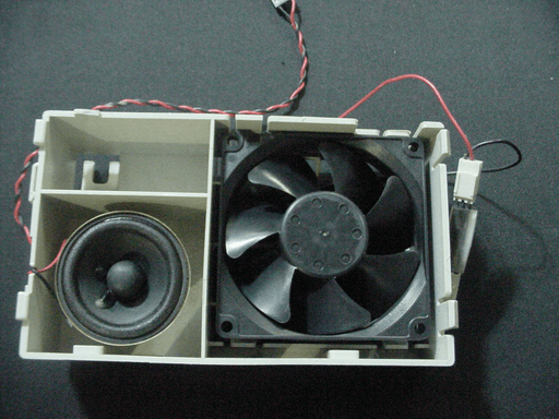 The same fan and speaker assembly from before but now it's clean.