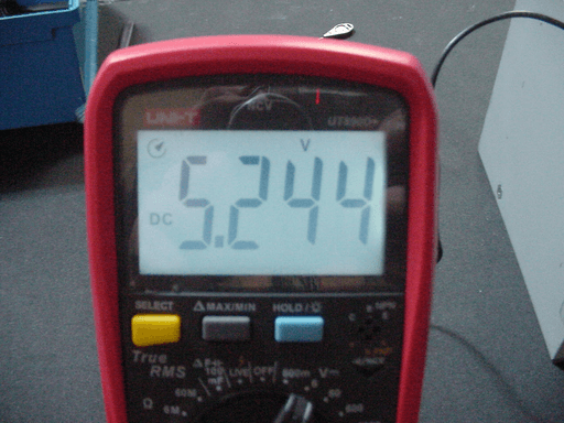 5.244 volts shown on a multimeter.