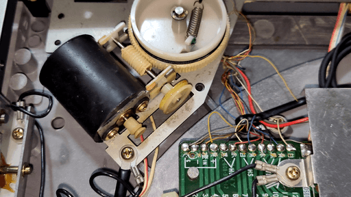 A photo of the area with the missing belt and loose wires which was also shown on the photos from the seller.